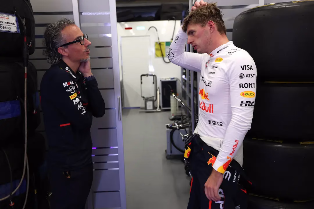 Max Verstappen and Laurent Mekies in the Red Bull garage during the 2025 Azerbaijan Grand Prix practice, symbolising the Red Bull F1 Revival.