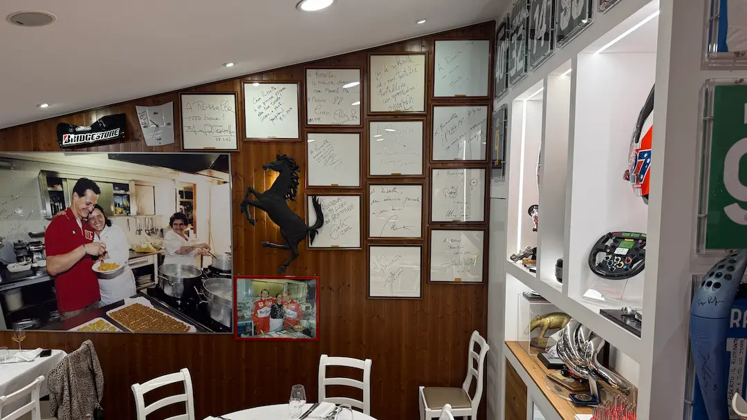 Inside Ristorante Montana in Maranello, showing Ferrari memorabilia, signed photos and racing artefacts on the walls. © Coffee Corner Motorsport