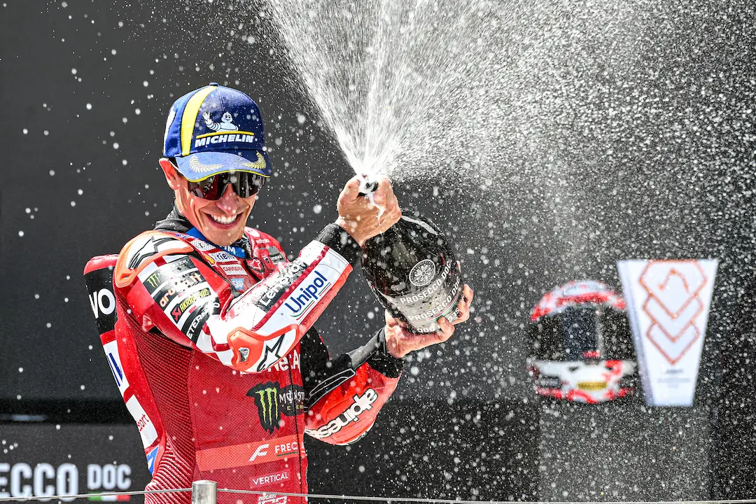MotoGP Grand Prix of Hungary 2026 winner Marc Marquez celebrates his 100th career Grand Prix victory on the podium at Balaton Park Circuit