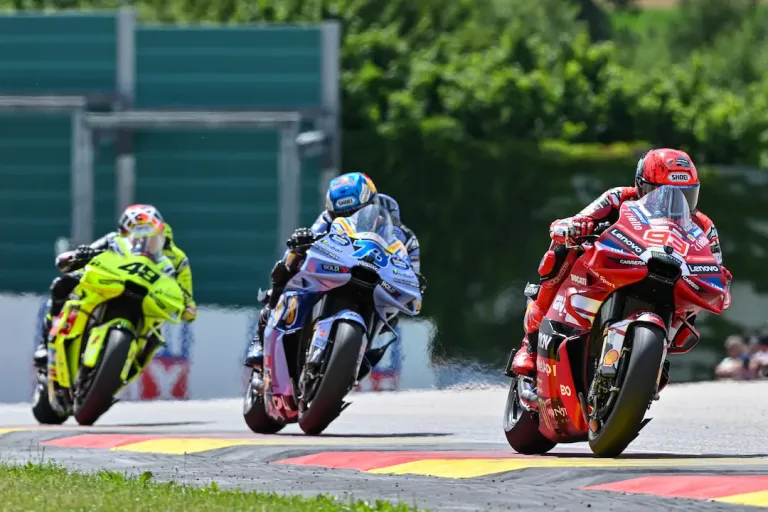 Marc Marquez on the number 93 Ducati leads Alex Marquez on the number 73 Gresini Ducati and Fabio Di Giannantonio on the number 49 VR46 Ducati during the MotoGP German Grand Prix 2026 Sprint at the Sachsenring. © MotoGP Media