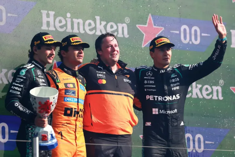 McLaren Dutch Grand Prix 2026 debrief: Lando Norris celebrates victory at Zandvoort with Kimi Antonelli and George Russell on the podium. © Pirelli Motorsport
