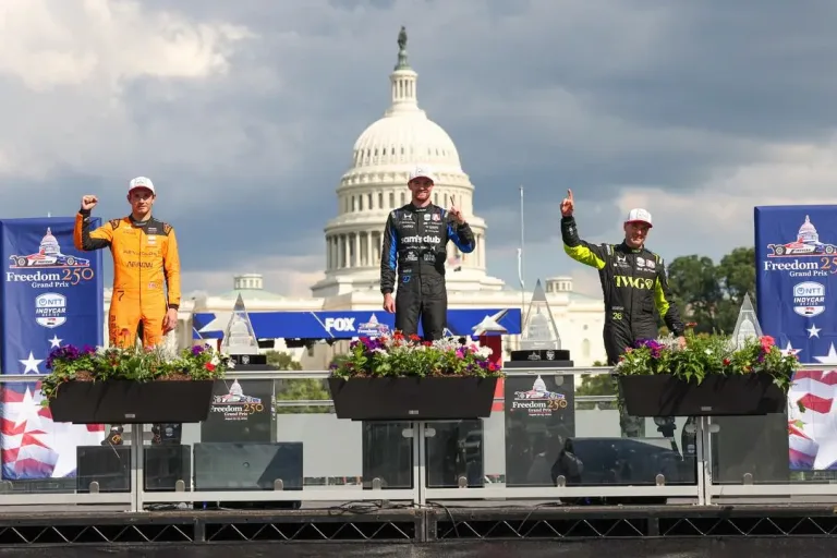 Freedom 250 Grand Prix of Washington DC podium with Christian Lundgaard, Kyle Kirkwood and Will Power in front of the US Capitol © Penske Entertainment: Chris Owens